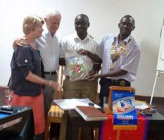 Presenting our banner to the Rotary Club of Mbale, Uganda