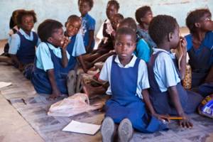 At Mnkhanya Community School five teachers have been teaching 400 pupils in just 2 run down classrooms with very few desks and none of the basic educational materials that our boxes provide.