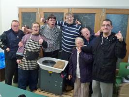 Excited members of the Friary Gardeners pottery group with their new potter’s wheel.