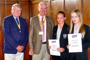 Lily and Hannah receive their winners' certificates