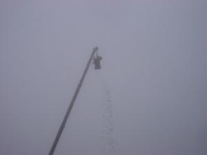 The 1000+ balls rising to nearly 200 feet before being dropped to earth through the mist and rain.