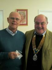 Phil receiving his award from President Anthony