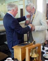 Ian Sargeant hands over the chain of office to the new President, George Alford