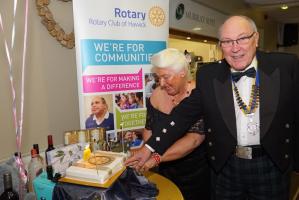 President Jim Walker and his wife Rosalyn cut the Hawick Club's 80th Birthday Cake at the 2016 President's Night