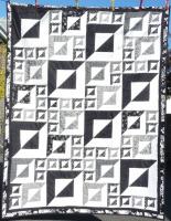 This beautiful handmade quilt is being raffled for 'End Polio Now' and other Rotary charities