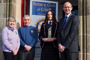 Trophy presentation to Lucy at Morrison's Academy