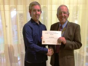 Our 2015 candidate, Toby Matthews, receiving his certificate from President Bob Sturland.