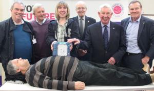 Stan Chapman with Rotary members at the handover.