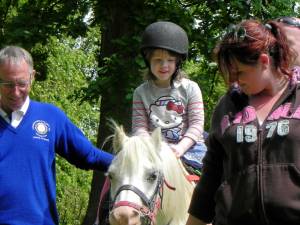 Sophie enjoys her first ever pony ride.