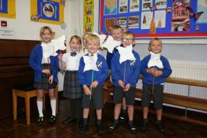 Children from St. Mary's primary school, Clayton-le-Moors proudly show their Pinwheels for Peace