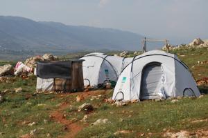<b>Shelterboxes in action</b> - just two of the emergency shelters and supplies sent to over 107,000 families worldwide following disaster since Shelterbox started on 2000