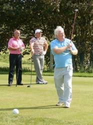 Welsh Rugby legend Steve Fenwick, (and also guest speaker on the night), drives off at the 2012 Tenby and Saundersfoot Rotary Golf Day 