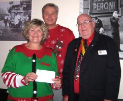 VP Mike Beecher presents the cheque to the Managers.