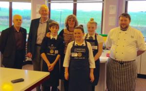 Picture shows Sam Finlayson, Hayley Nisbet and Adele Patterson with (L to R) Rotarians Fye Milligan, Ed Hunter, Sanquhar Academy Principal Teacher Curriculum Tricia Mitchell and Chef Will Pottinger.