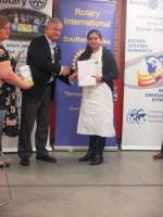 District Governor Steve Jenkins presents Jillpa Patel with her Certificate of Participation