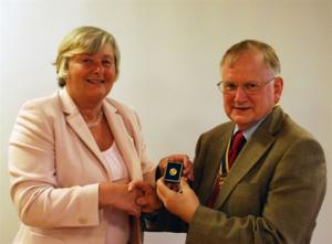 Past President Alison presented President Stephen with a sapphire Paul Harris Fellowship.