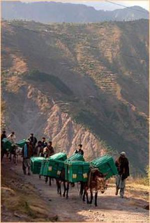Shelterboxes being taken to mountain areas struck by earthquake in Pakistan