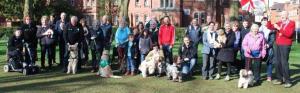 A pack of dog walkers, with trusty four legged friends - ready for the off