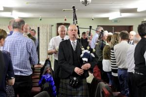 Wullie Prentice piping and Alec Waugh presenting of the Haggis.