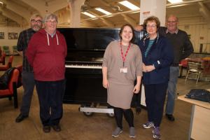 Donating a piano to SIFA Fireside