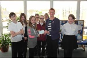 Janet receives a cheque from Pitreavie Primary School for a record £272 for End Polio Now from their Purple Pinkie Day.The School has now raised close to £1000 over 6 years!