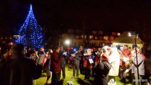 Potters Bar Town Band plays Christmas Carols around the newly lit tree.
