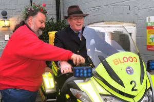 President Andrew tries out a "Blood Bike" for size....
