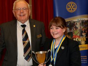 The contestant judged as "Best Individual Speaker" is awarded the Selwood Cup by Phil Cary on behalf of the Rotary Club of Frome Selwood.