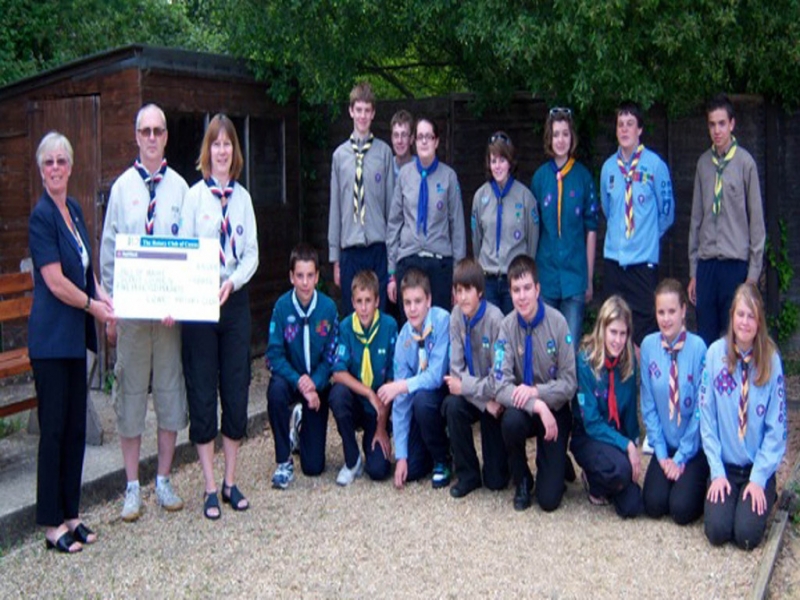 President Anna Morgan-Crockett of the Rotary Club of Cowes presents a cheque for &pound;500 to the Isle of Wight Scout Council