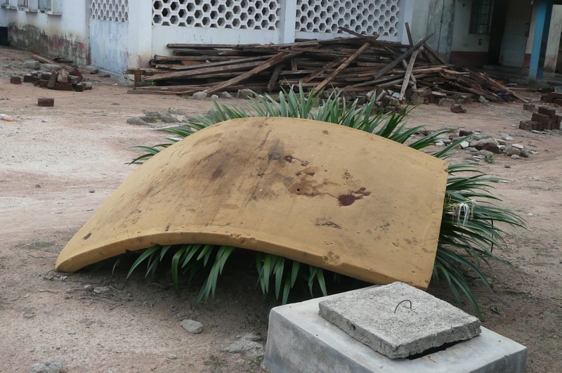 Soiled mattress drying in the sun before being put back on the bed.