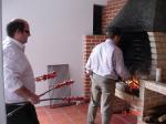 Chef President Louren�o takes charge of the BBQ supported by the President of Roteract Leonardo