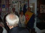 Saluting the flags ceremony at the Club meeting