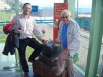 Ron with his luggage accompanied by Lourenco