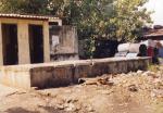 BEFORE: Disused toilets and pit front.