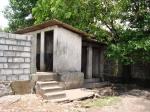 PROGRESS: Side view of new toilet/wash block.