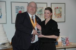 Taryn receiving prize from Keith Davison