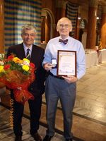 Brian receiving the Honorary Citizen award