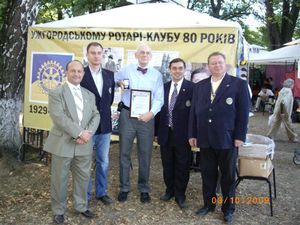  Rotarians at the same event who are celebrating the City and publicising Rotary. On the immediate left is Ivan Kurac the Chief hospital doctor, Second right is Andriy Bahanych, an Uzhgorod member and    IPDG D 2230