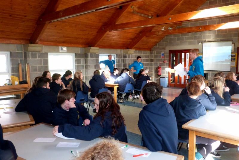 Students receive certificates at the end of the camp.