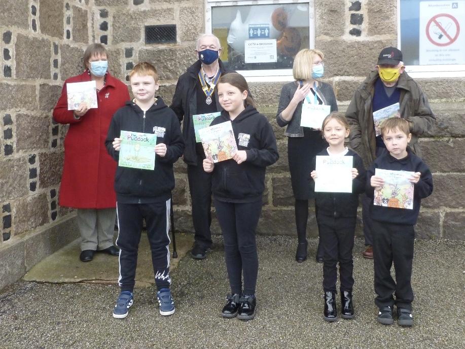 Fraserburgh Rotarians handing over doric books