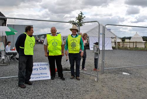 Ivan, Martin and Bruce promoting Rotary and helping out....