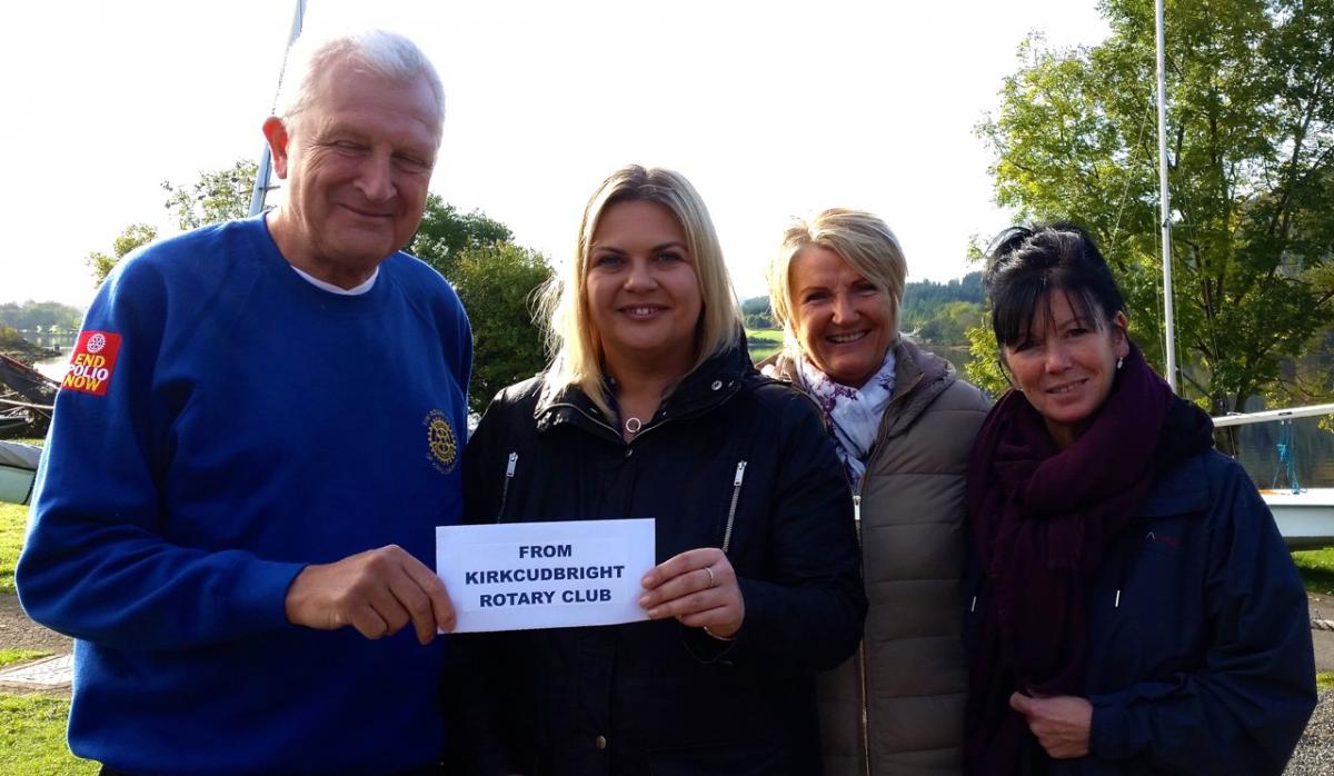   Youth Convenor Paul Tebay presenting a cheque from Kirkcdudbright Rotary Club for Â£100 to Sara Jackson, Young Carers Manager of the Dumfries and Galloway Young Carers Project, at the Galloway Activity Centre. The money will help to meet the cost of