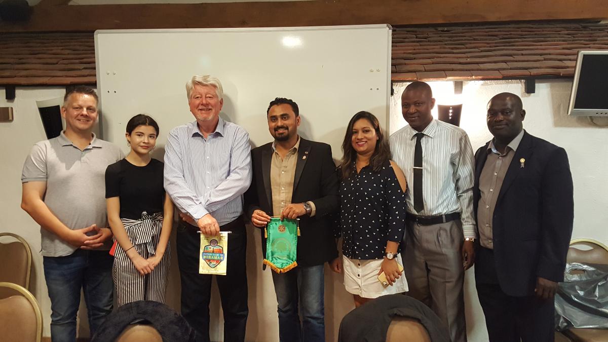 Elise with her father and visitors from Goa, Nigeria and Burnham along with President Michael