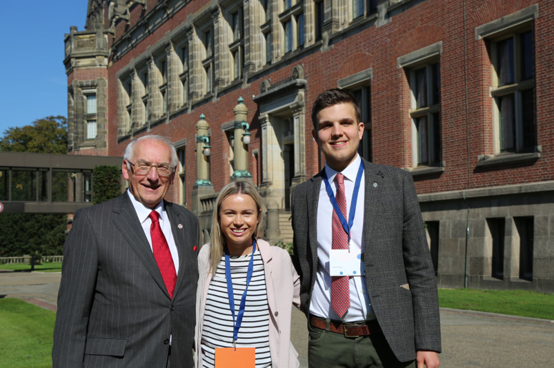 Our Ambassadors and the Project Direcor outside the Peace Pqalace