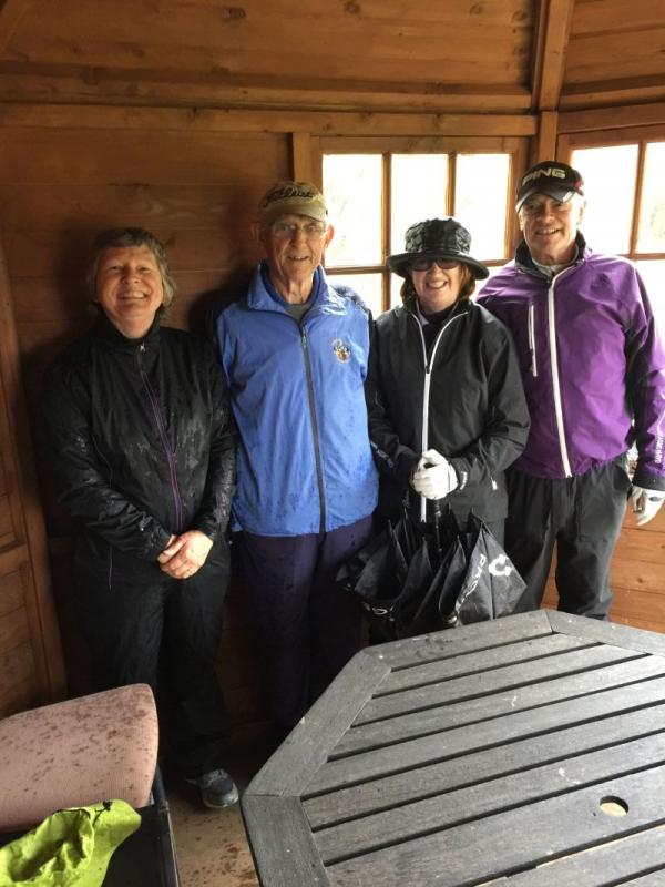 Helen, Vic, Marlene and Bill - taking a break from the rain....and hail!