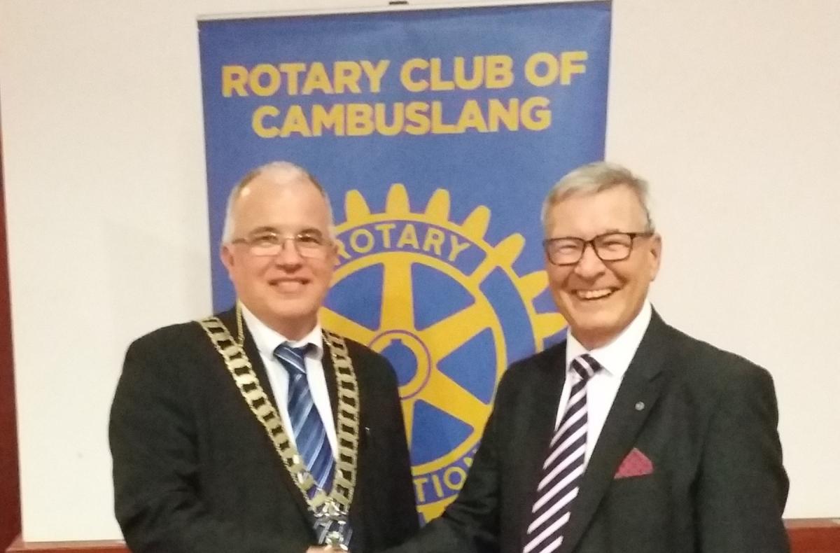New President Kenny Finnie congratulated by Past President Robert Dickie