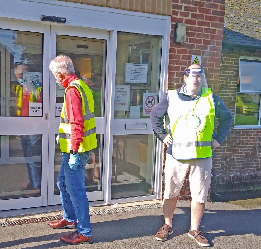 Volunteers help with vaccination days