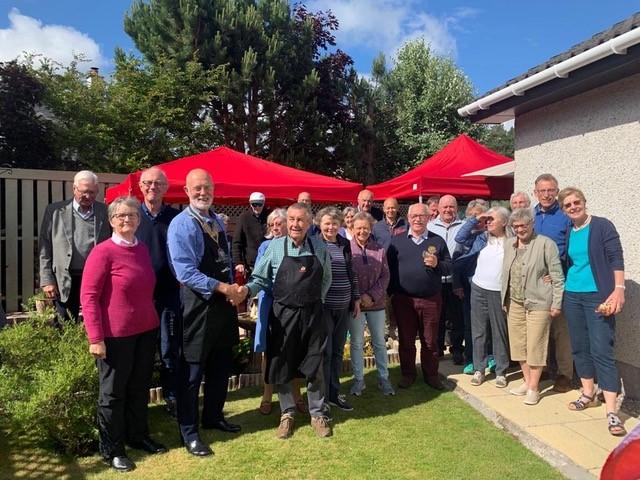 Club Members and partners at the Barbeque