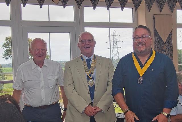 Past President Roger Burns with incoming President Gareth Irving and Vice President Simon Price