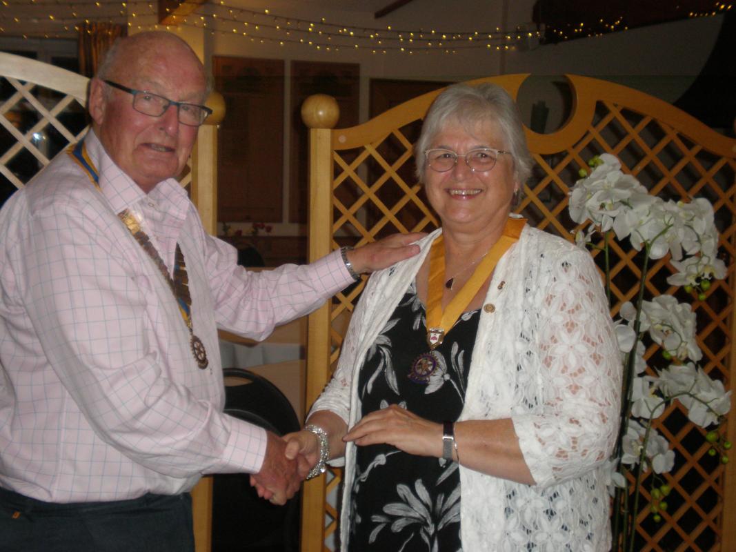 President John Reid congratulates Maria on her election as  Vice president of our club.